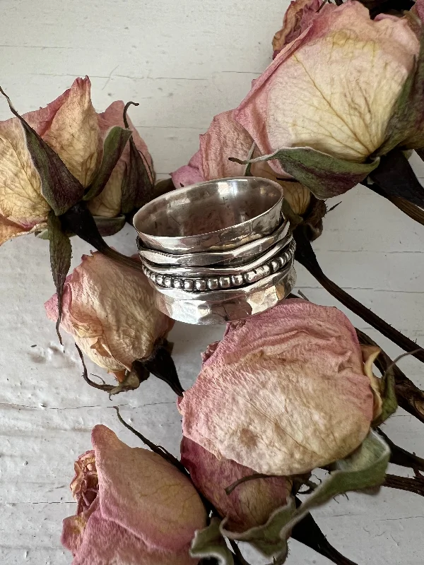 hammered sterling silver band Four Spinner Meditation Ring