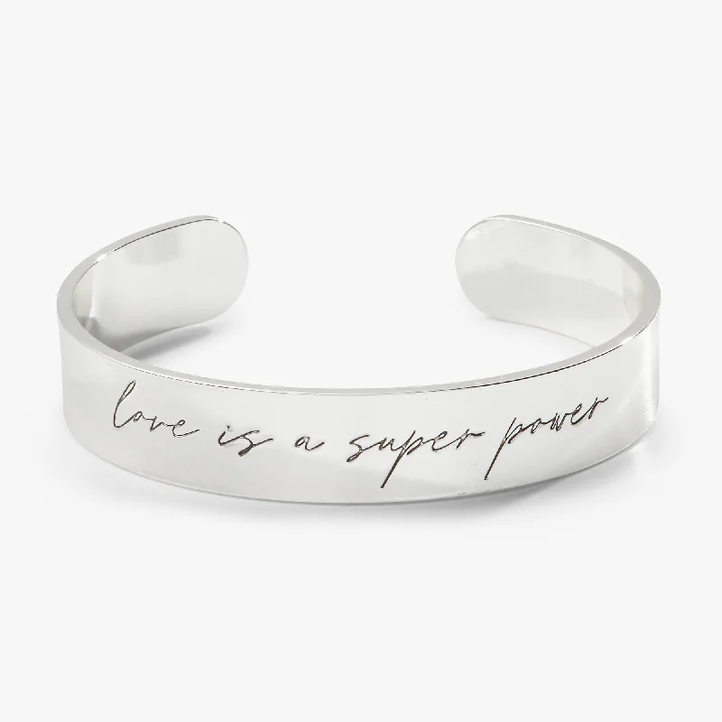 emerald-cut engagement ring halo Love is a Superpower Cuff Bracelet