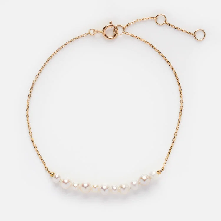rose gold cubic zirconia earrings Solid Gold Pearl Strand Bracelet