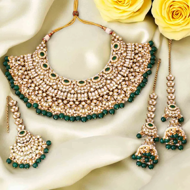oval cut engagement ring platinum Emerald Asmita Kundan Jewellery Set