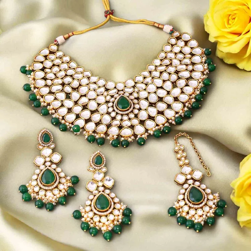 white gold diamond cluster ring Emerald Vandanti Kundan Jewellery Set